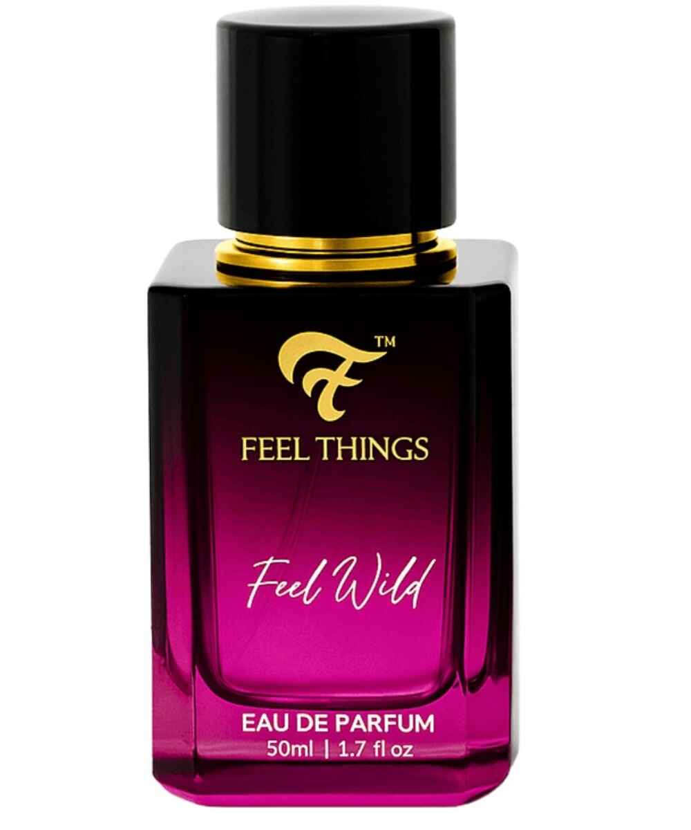 Perfume bottle labeled 'Feel Things Feel Wild' on a white background