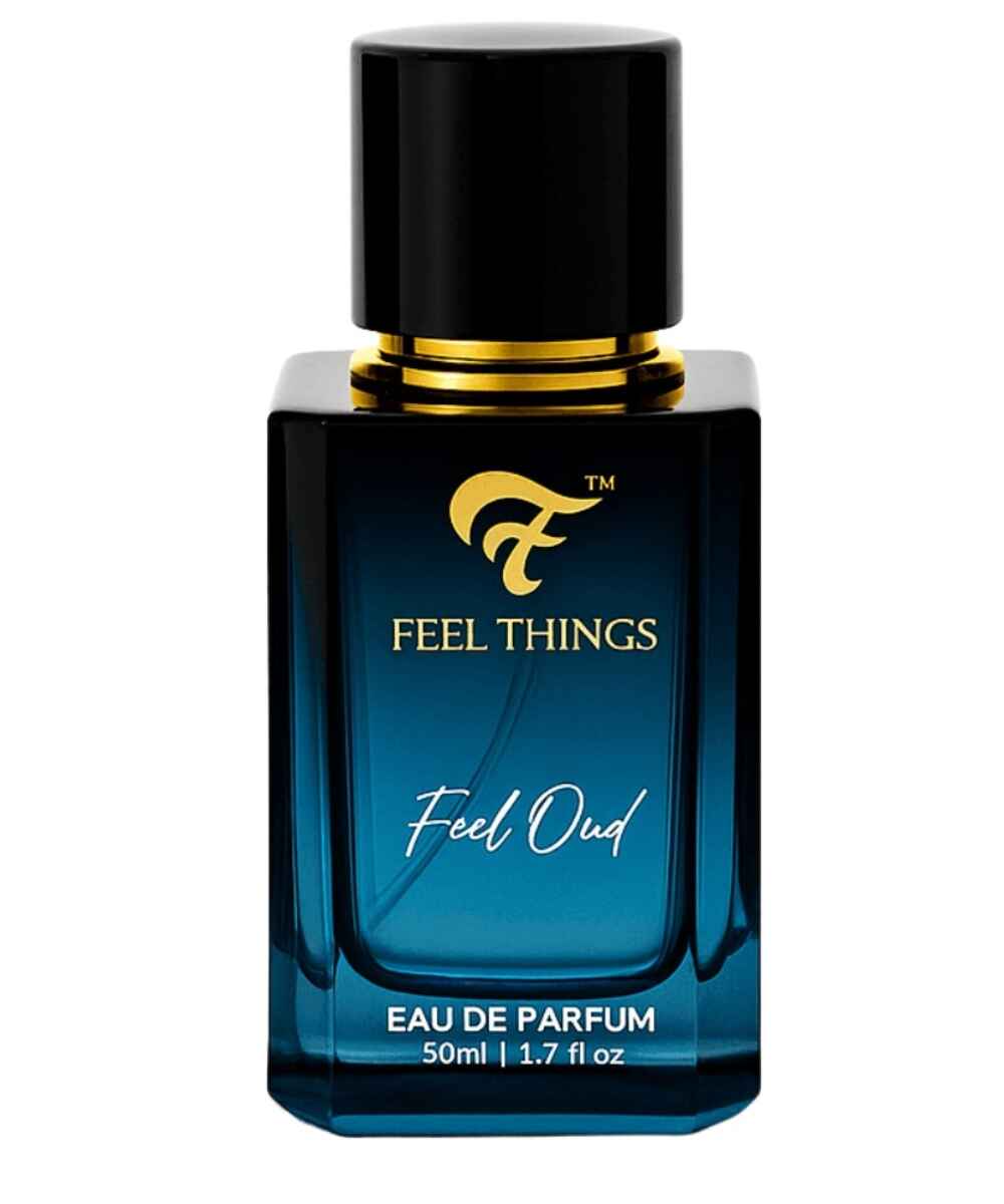 Perfume bottle labeled 'Feel Things Feel Oud' on a white background