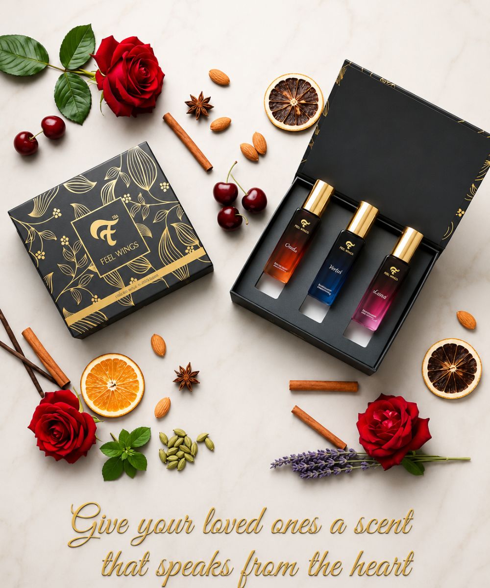 2*20ml Set of feel things perfume bottles with decorative packaging on a table with flowers and spices.