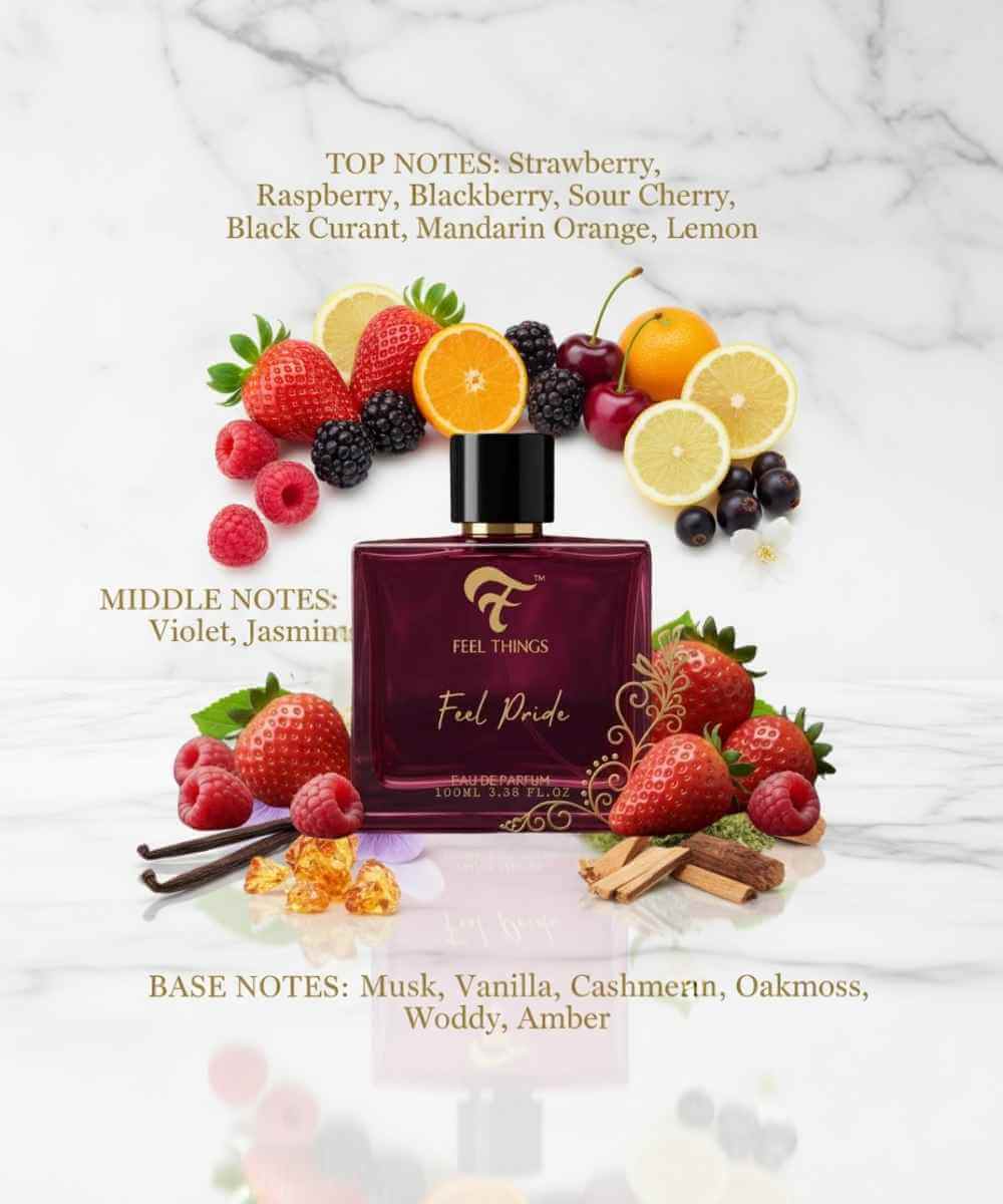 Feel pride Perfume bottle with fruit-themed packaging on a marble background