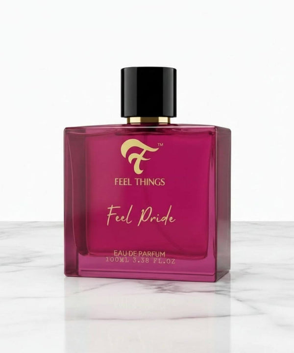 Feel  pride perfume bottle with black cap on a white marble surface