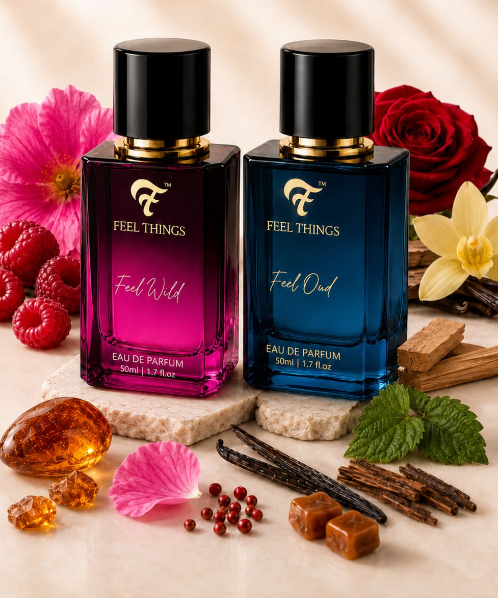 feel oud and feel wild Two bottles of 'Feel Things' perfume with floral and fruit elements on a light background