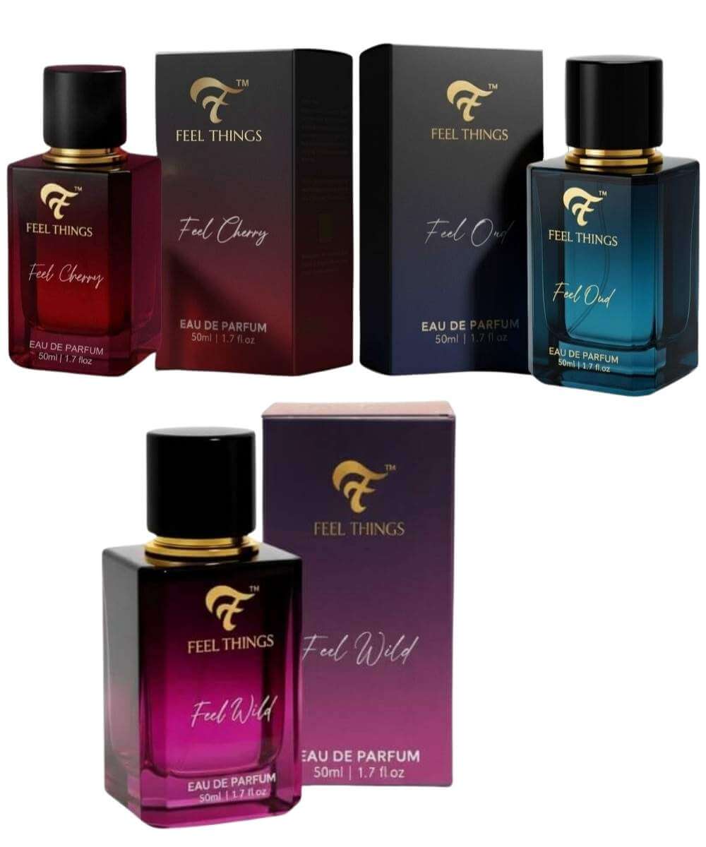 Collection of Feel Things perfume bottles and boxes on a white background